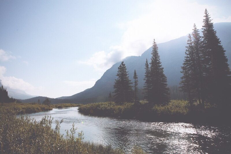 River in Mountain Valley — Blue, Serene, Afternoon, Photograph, Mountains, Trees, Green