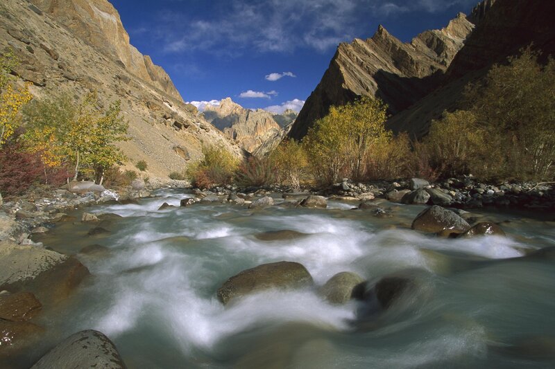 River in Mountain Valley — Blue, Serene, Autumn, Photograph, Mountains, Trees, Rocks