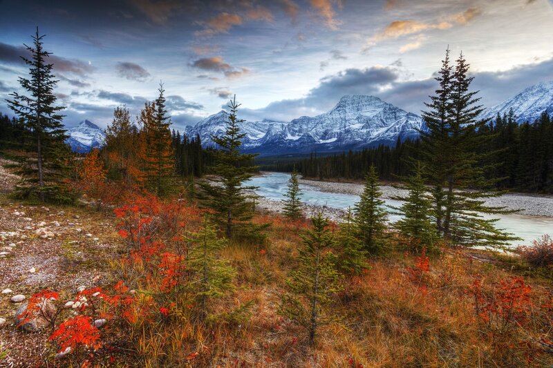River in Mountain Valley — Blue, Serene, Autumn, Photograph, Snow-capped Mountains, Evergreen Trees
