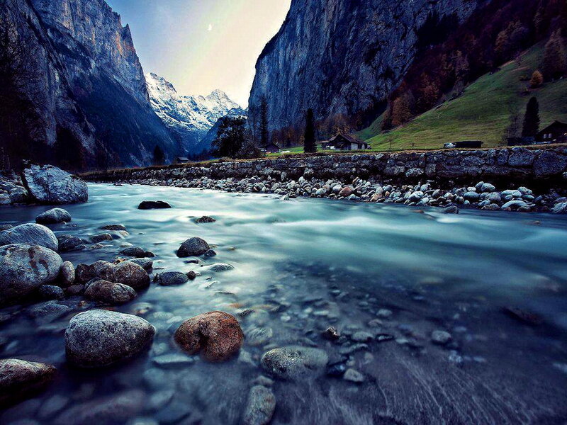 River in Mountain Valley — Blue, Serene, Morning, Photograph, Mountains, Huts