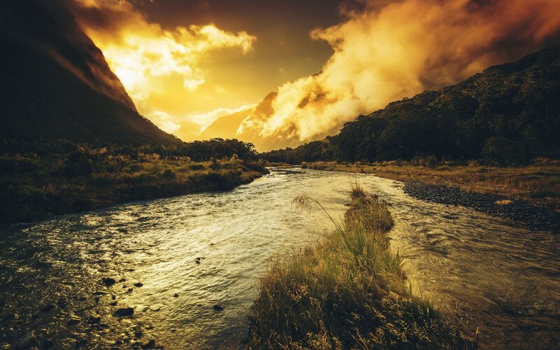 River in Mountain Valley — Gold, Dramatic, Sunset, Photograph, Mountains, Clouds, Grass