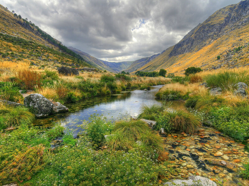 River in Mountain Valley — Green, Dramatic, Afternoon, Photograph, Mountains, Stream, Grass