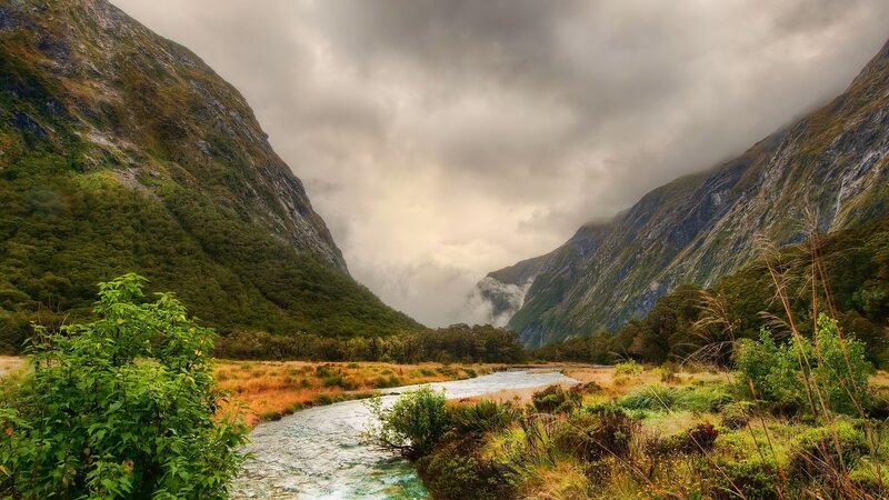 River in Mountain Valley — Green, Dramatic, Photograph, Mountains, Clouds, Vegetation