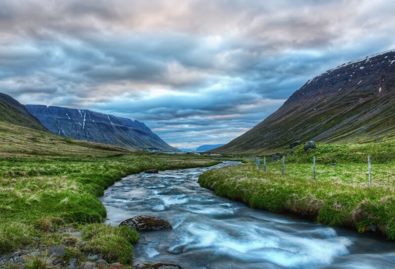 River in Mountain Valley — Green, Dramatic, Sunset, Photograph, Mountains