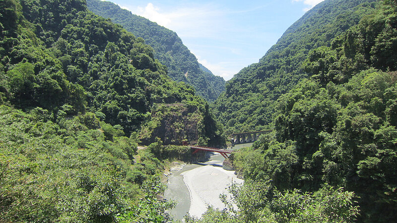 River in Mountain Valley — Green, Serene, Afternoon, Photograph, Bridge