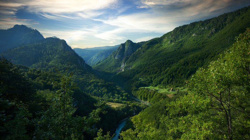 River in Mountain Valley — Green, Serene, Afternoon, Photograph, Mountains, Trees, Sky