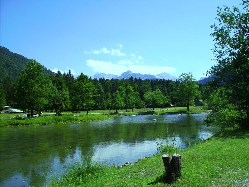 River in Mountain Valley — Green, Serene, Afternoon, Photograph, Trees, Mountains, Grass