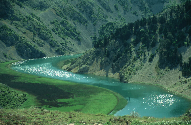 River in Mountain Valley — Green, Serene, Afternoon, Photograph, Vegetation