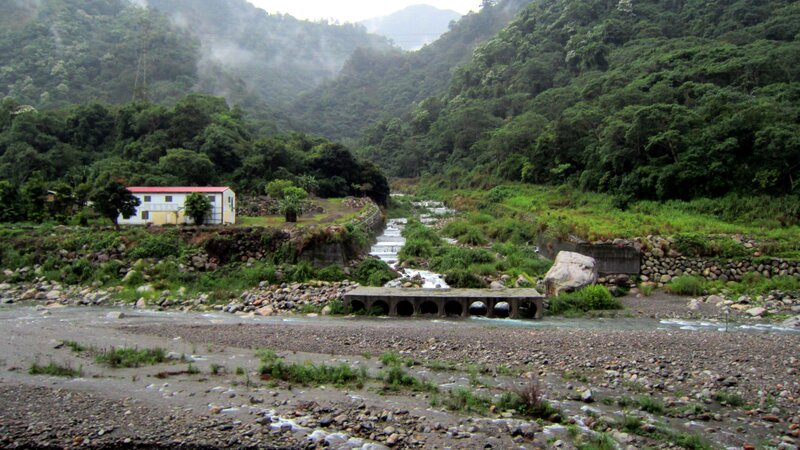 River in Mountain Valley — Green, Serene, Photograph, Building