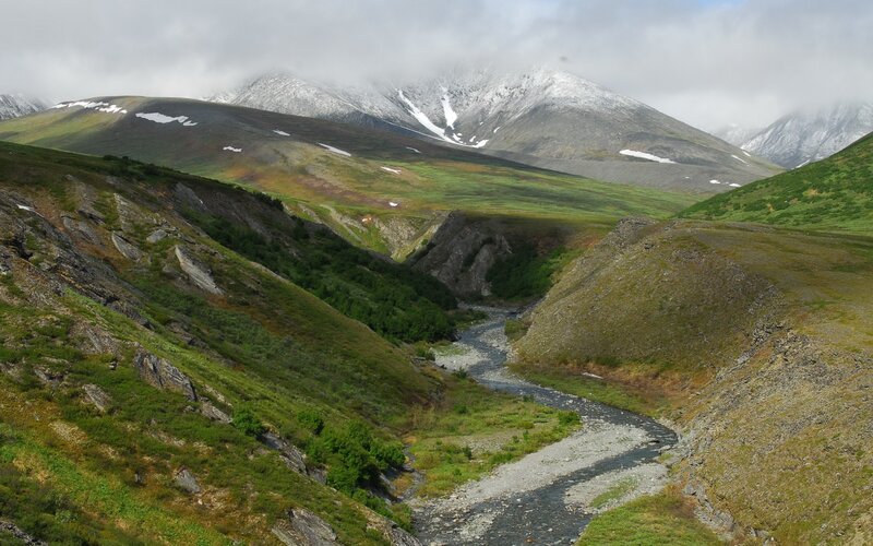 River in Mountain Valley — Green, Serene, Summer, Photograph, Mountains, Snow, Stream