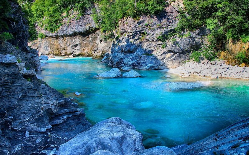 River in Rocky Canyon — Blue, Serene, Afternoon, Photograph