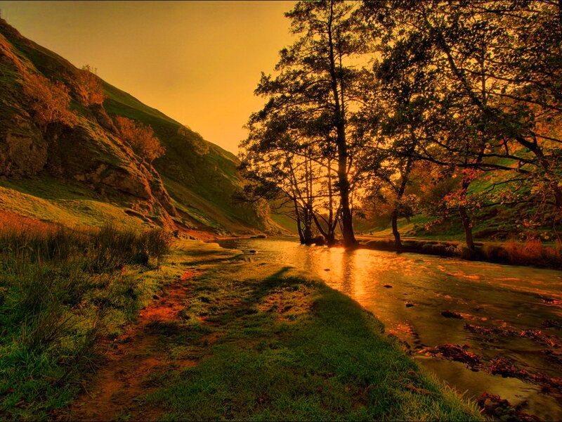 River in Valley at Sunset