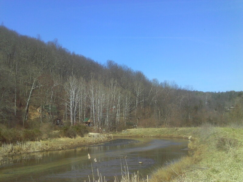 River in Wooded Valley