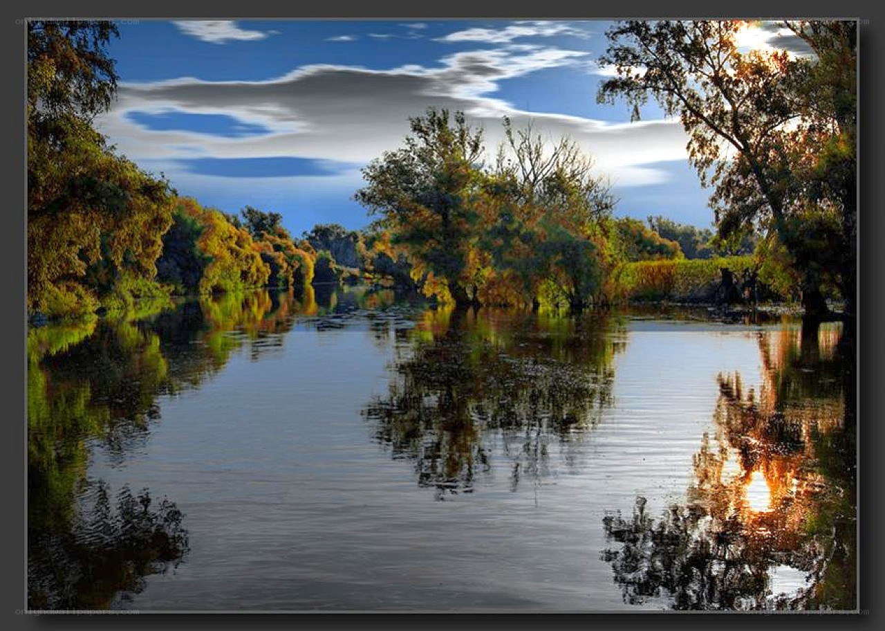 River landscape with autumn trees