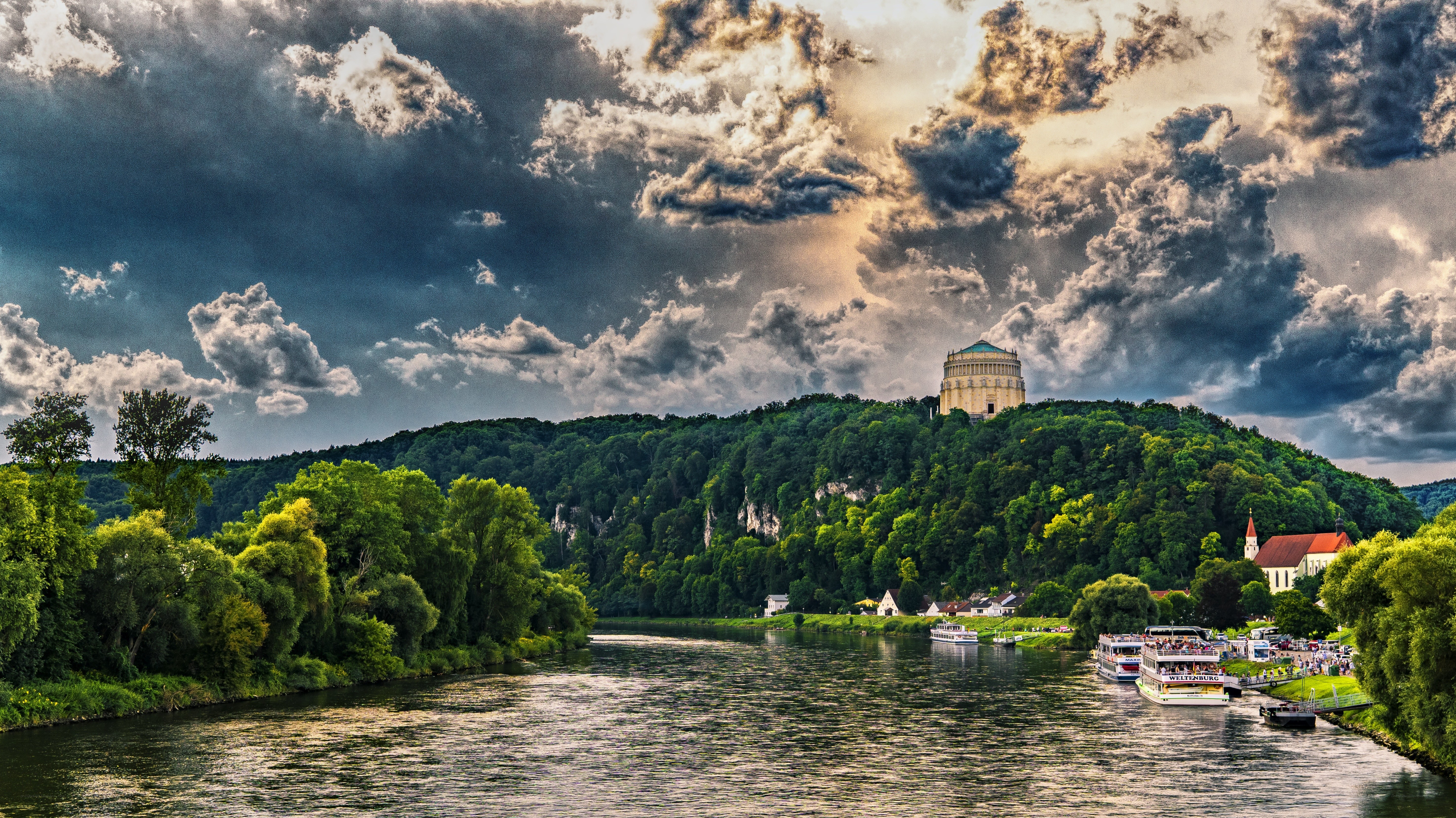 River landscape with hilltop building
