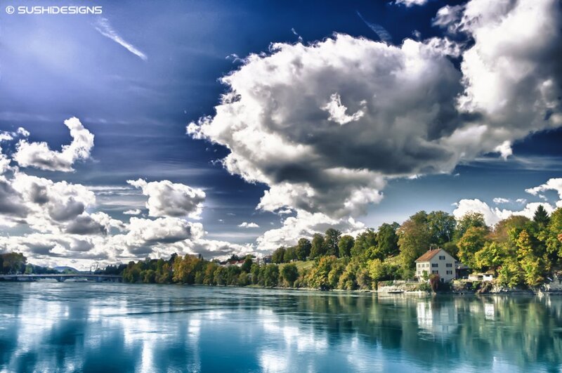 River Landscape with House