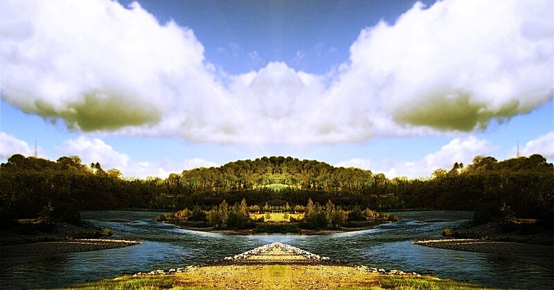 River landscape with mirrored sky