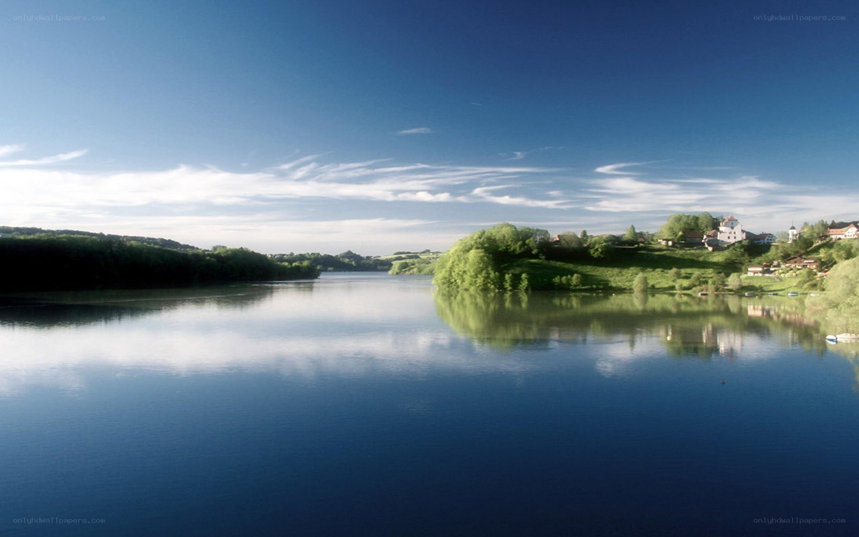 River landscape with village