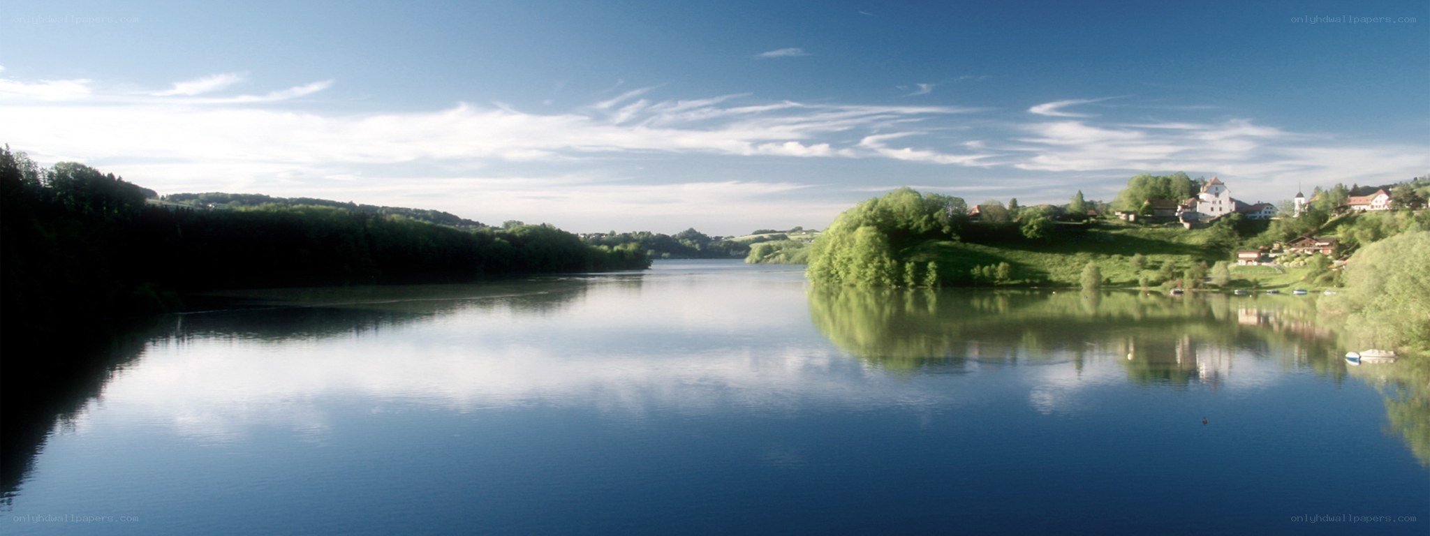 River landscape with village