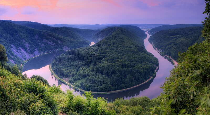 River meander in forested valley