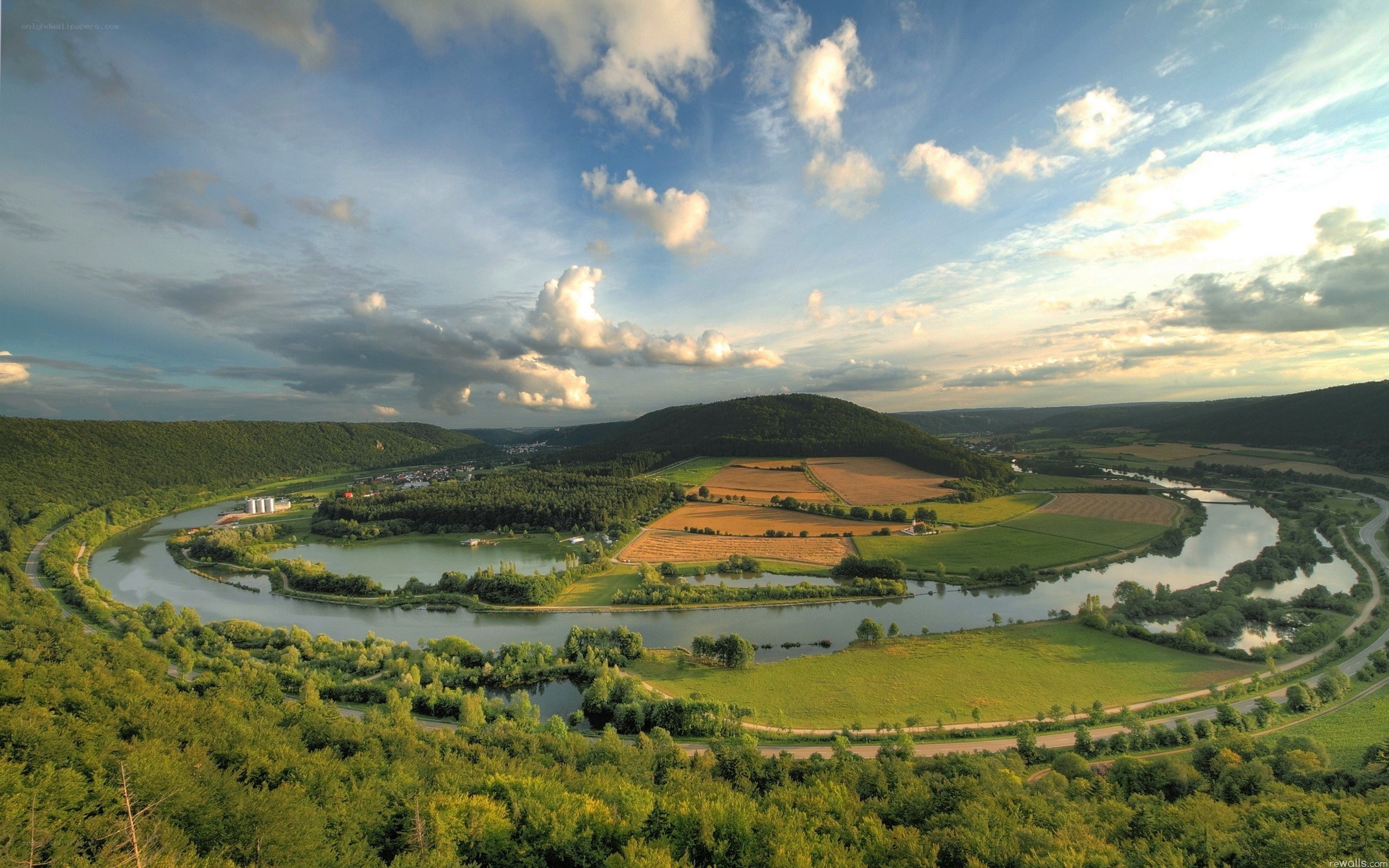 River meander in green valley