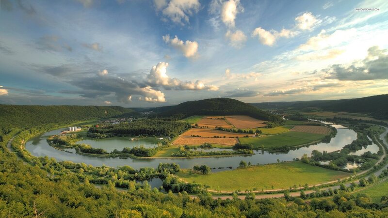 River Meandering Through Valley