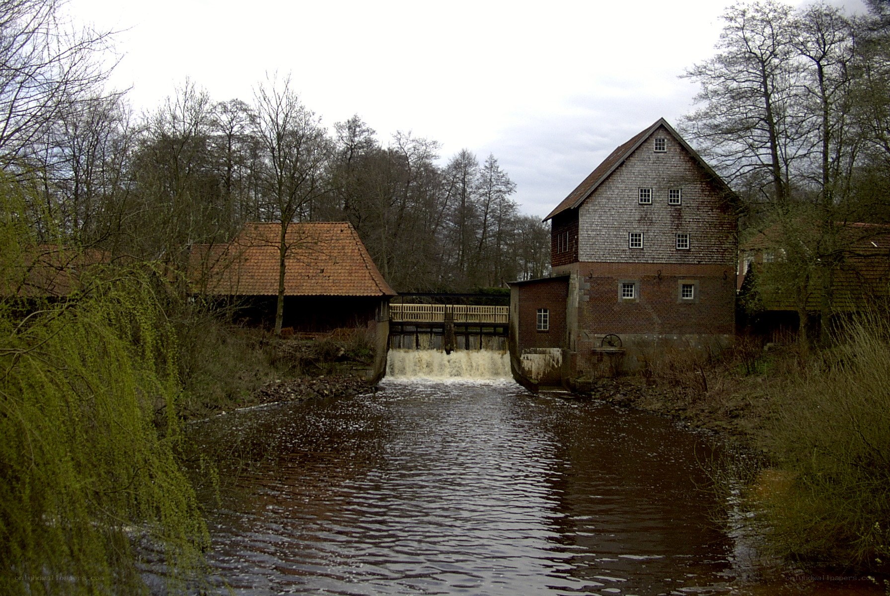 river mill with waterwheel