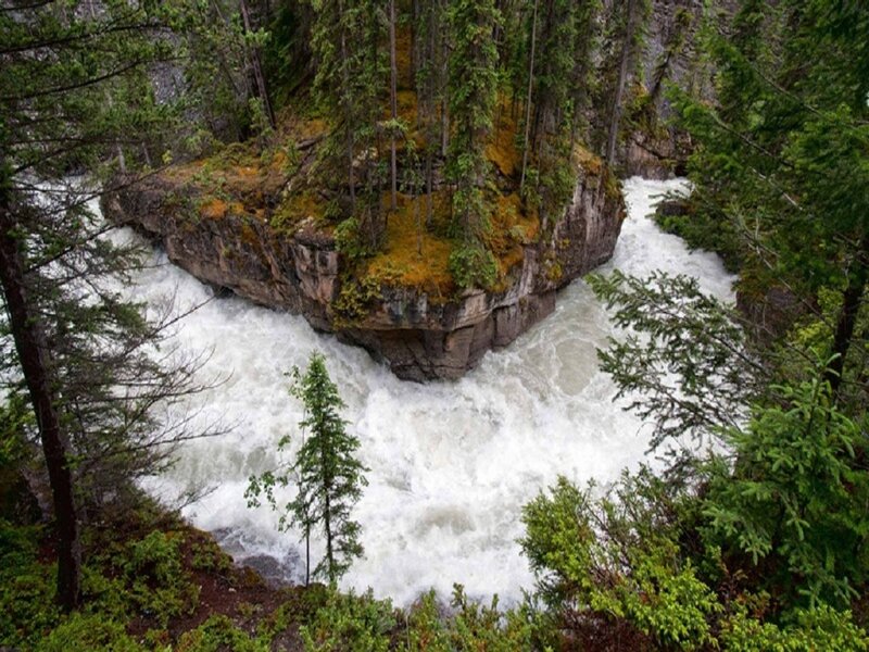 River Rapids Around Rock — Green