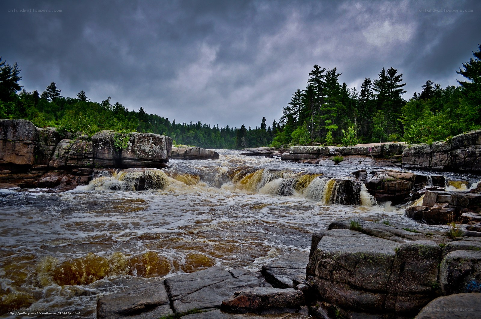 River rapids under stormy sky