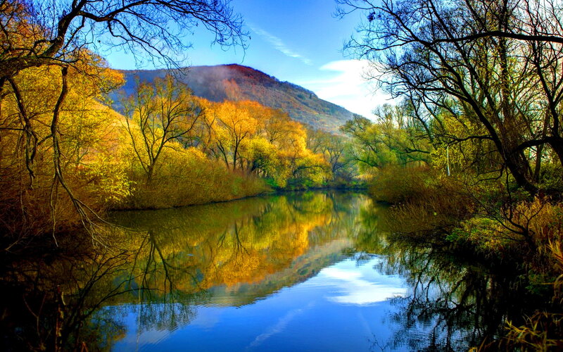 River Reflecting Autumn Trees — Blue, Serene, Photograph