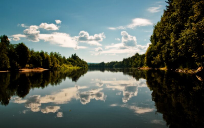 River reflecting sky and clouds