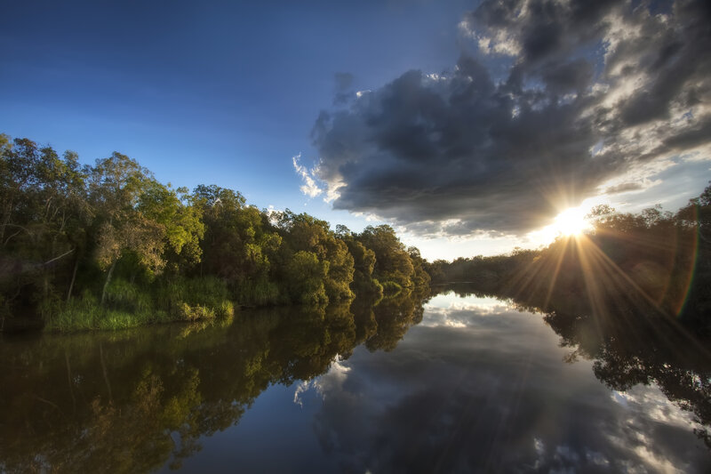 River Reflecting Sky — Blue, Dramatic, Sunset