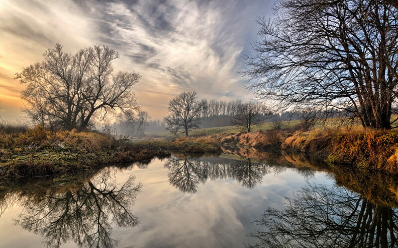 River Reflecting Trees — Blue, Serene, Sunset