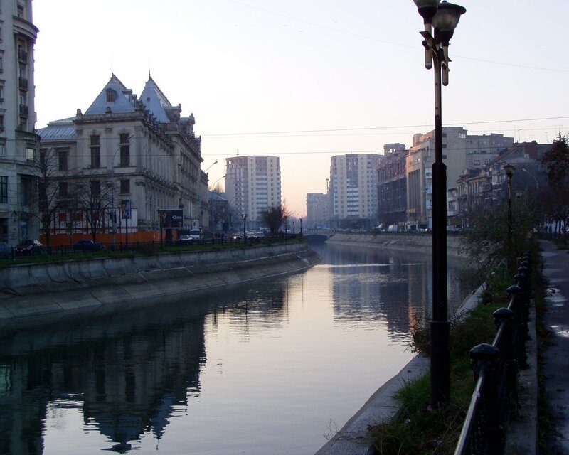 river scene in city at dawn