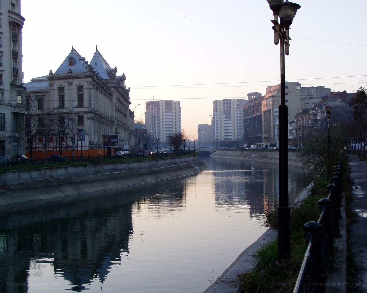 river scene in city at dawn