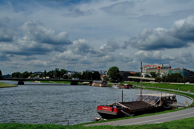 River scene with boats and city