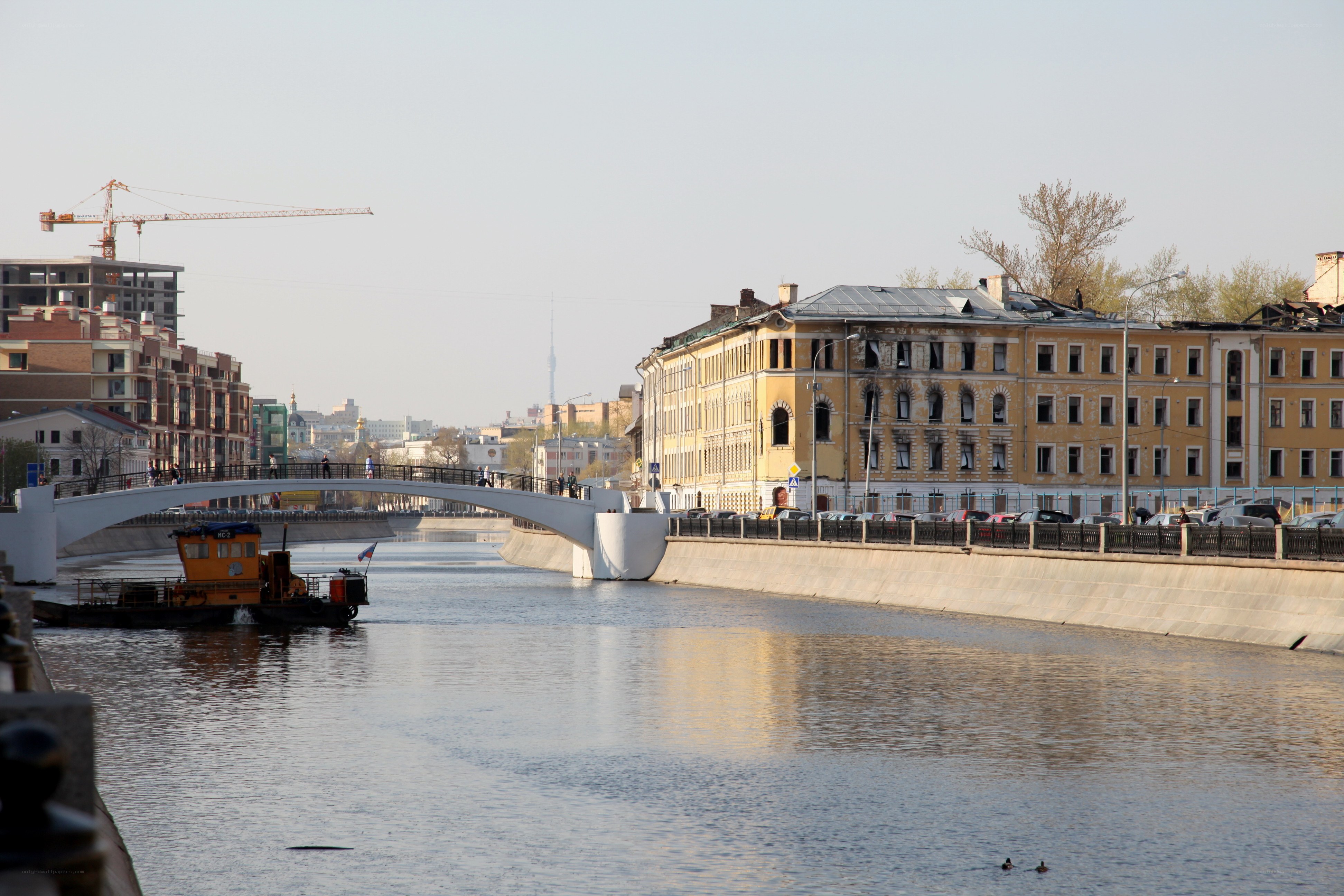 River scene with bridge and buildings