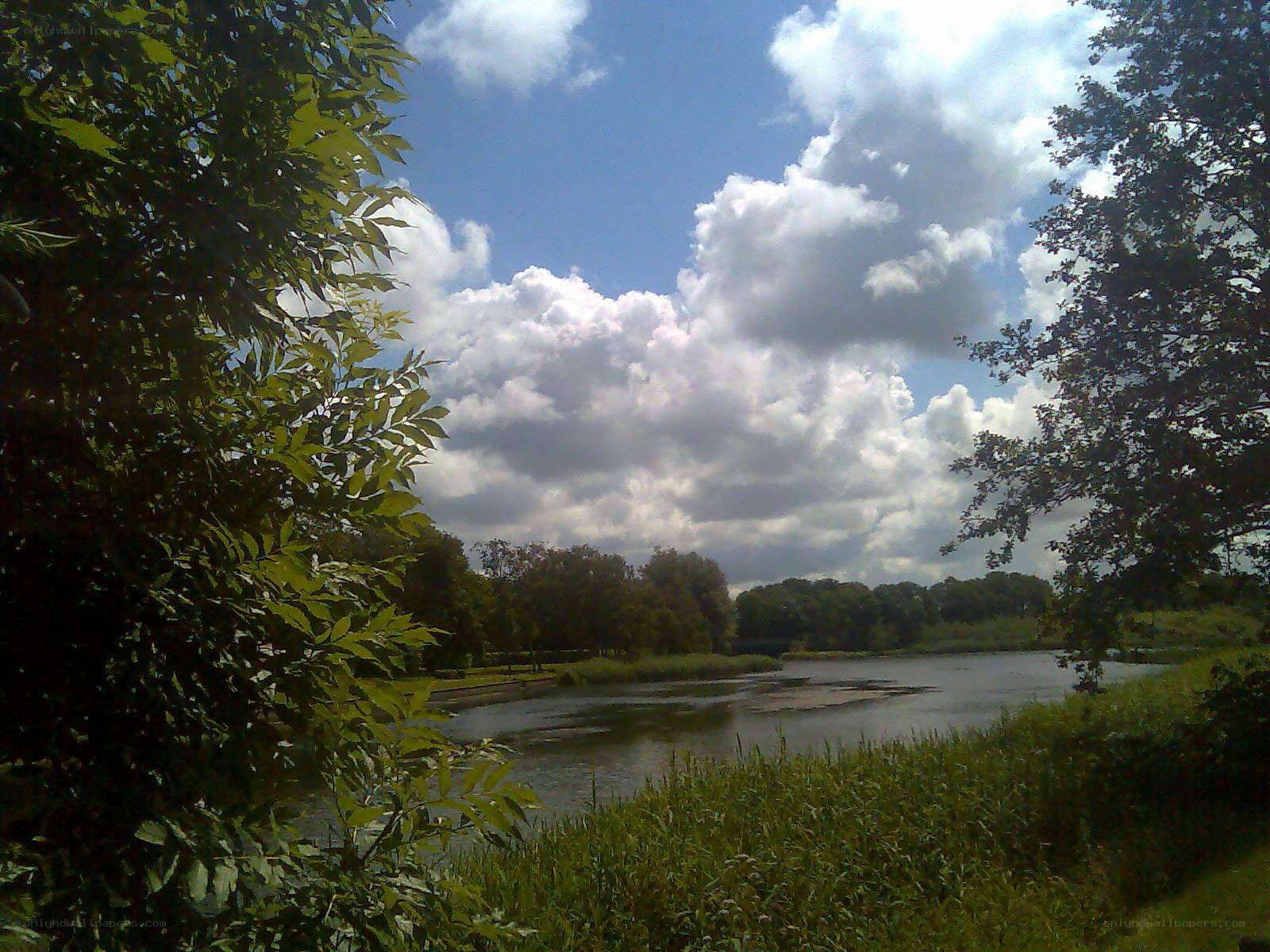 River scene with cloudy sky
