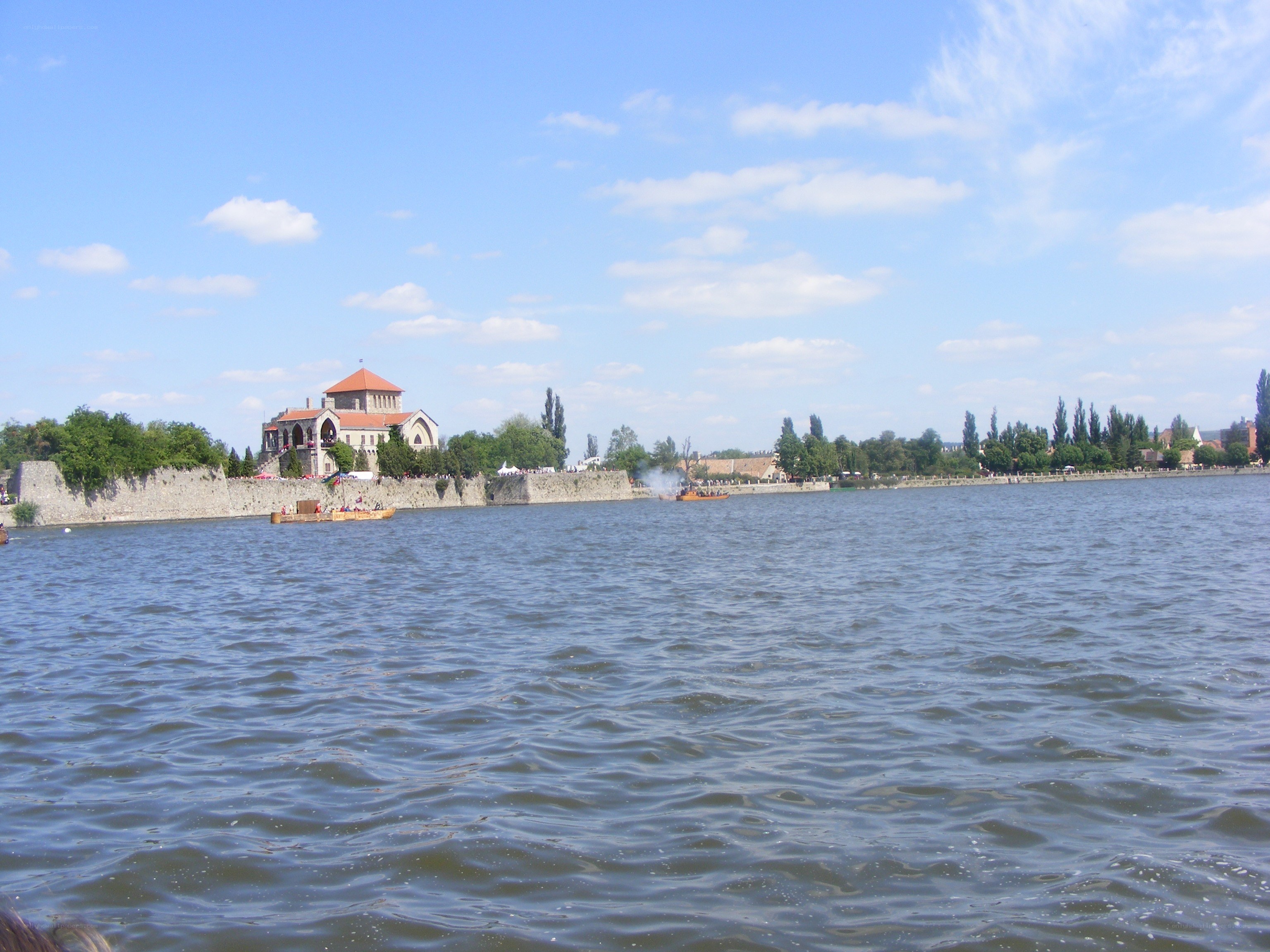 River scene with historic building