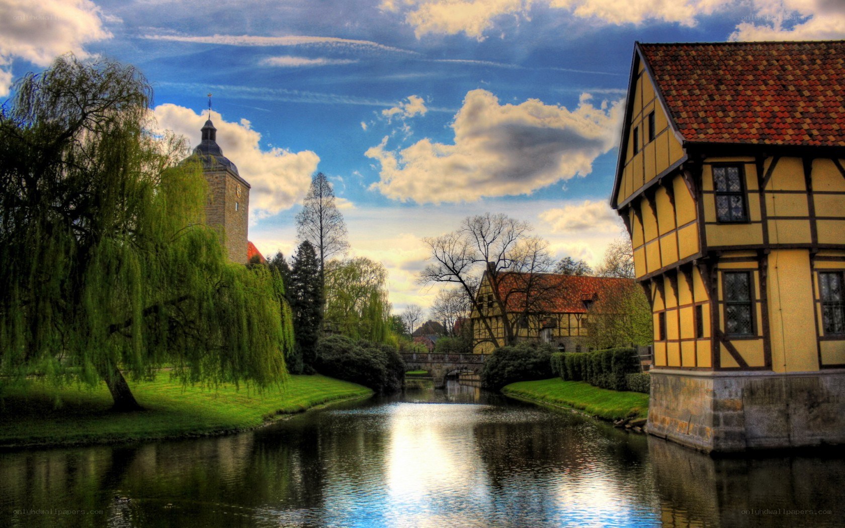 River scene with historic buildings