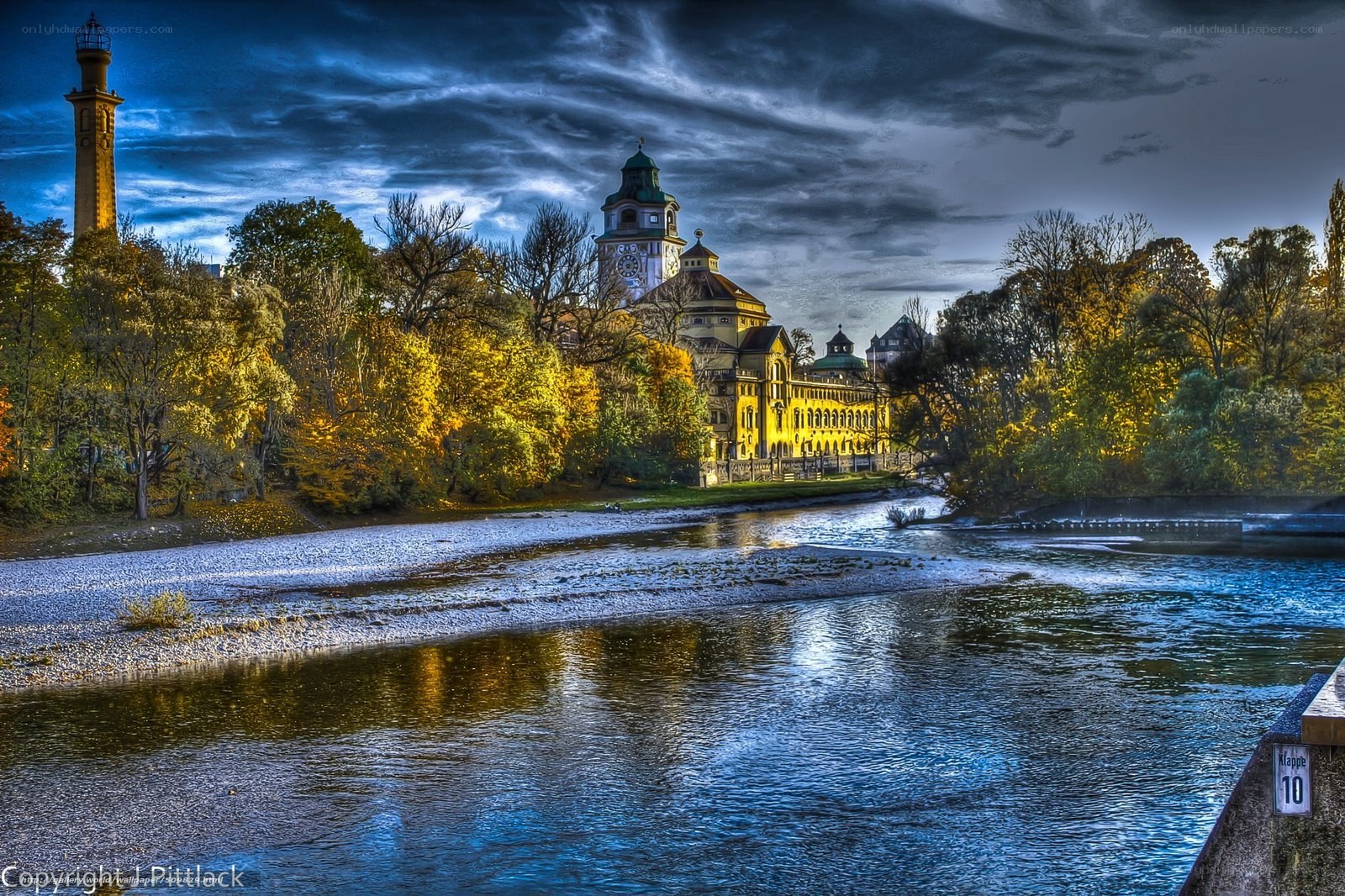 River scene with historic buildings
