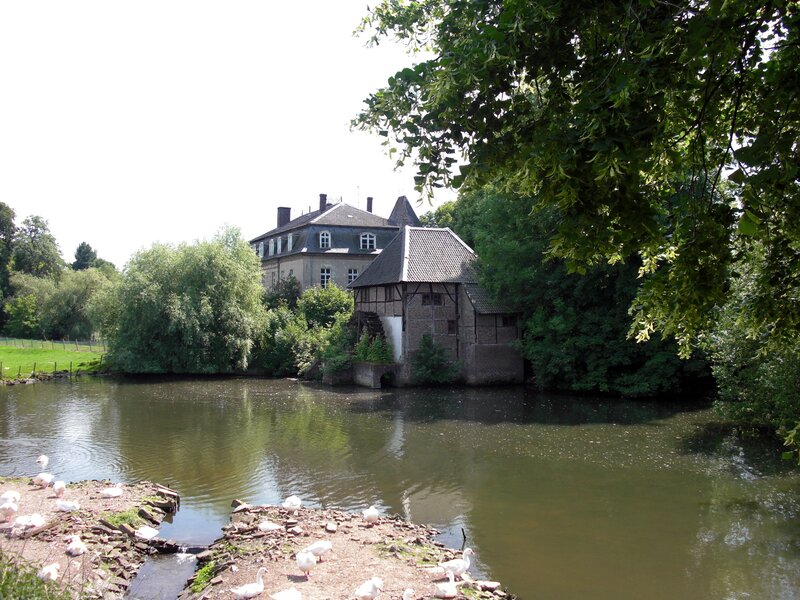 River scene with mill and house