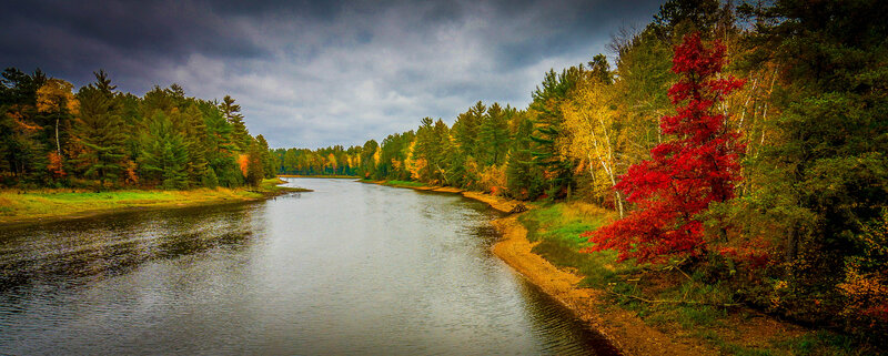 River Through Autumn Forest — Green, Dramatic