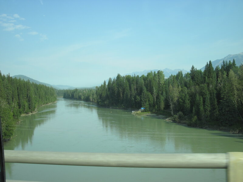 River Through Forest — Green, Serene, Afternoon, Photograph, Trees, Mountains