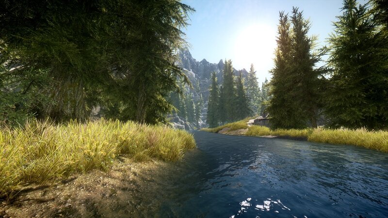 river through forested mountains