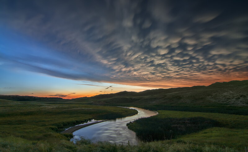 River Through Grassland — Blue, Dramatic, Sunset