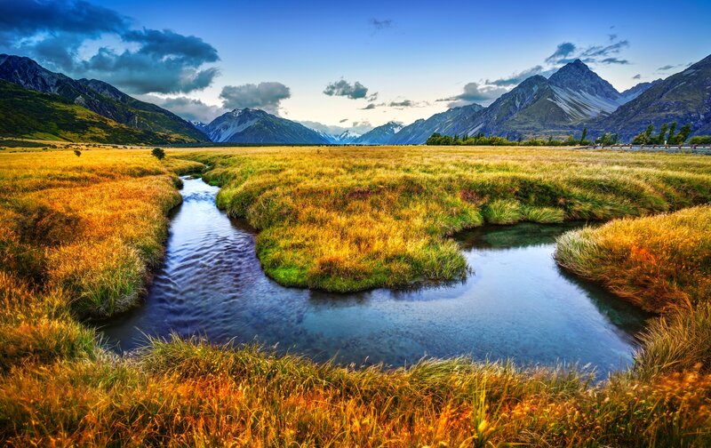 River Through Grassy Field — Blue, Serene