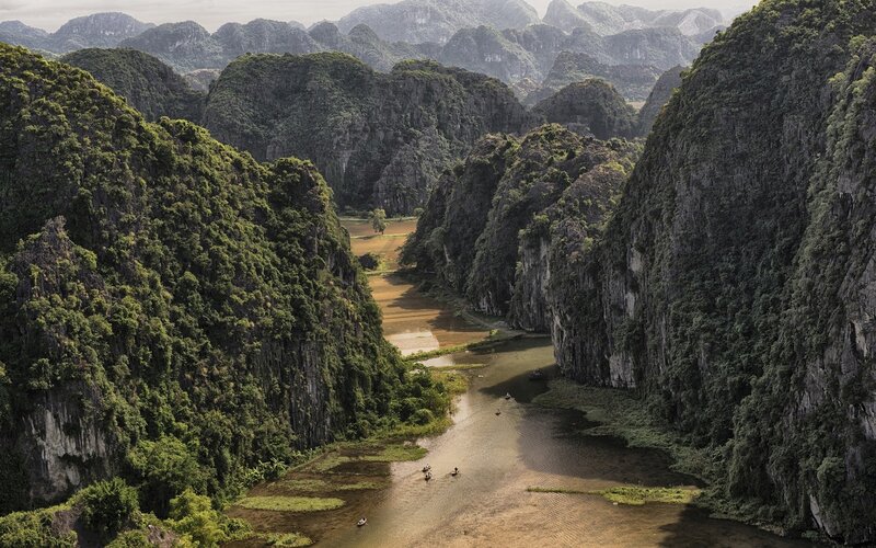 River Through Limestone Cliffs