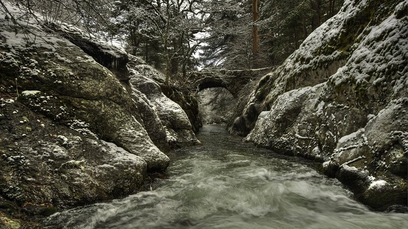 River Through Snowy Canyon — Gray, Serene