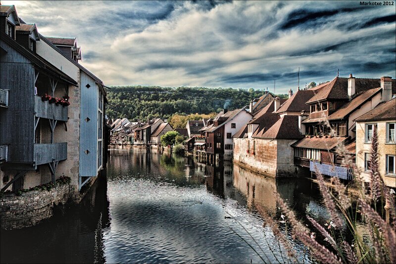 River town under cloudy sky